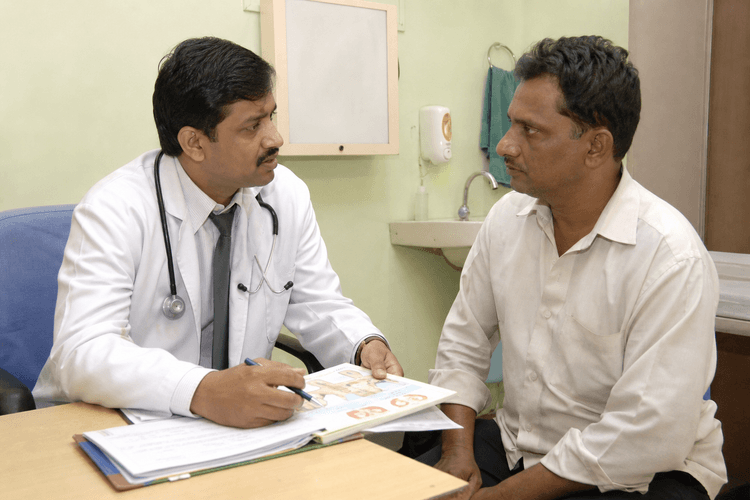 Doctor consulting a patient